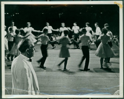 Bascom Lamar Lunsford watches a dance team at the Mountain Dance and Folk Festival in Asheville, NC